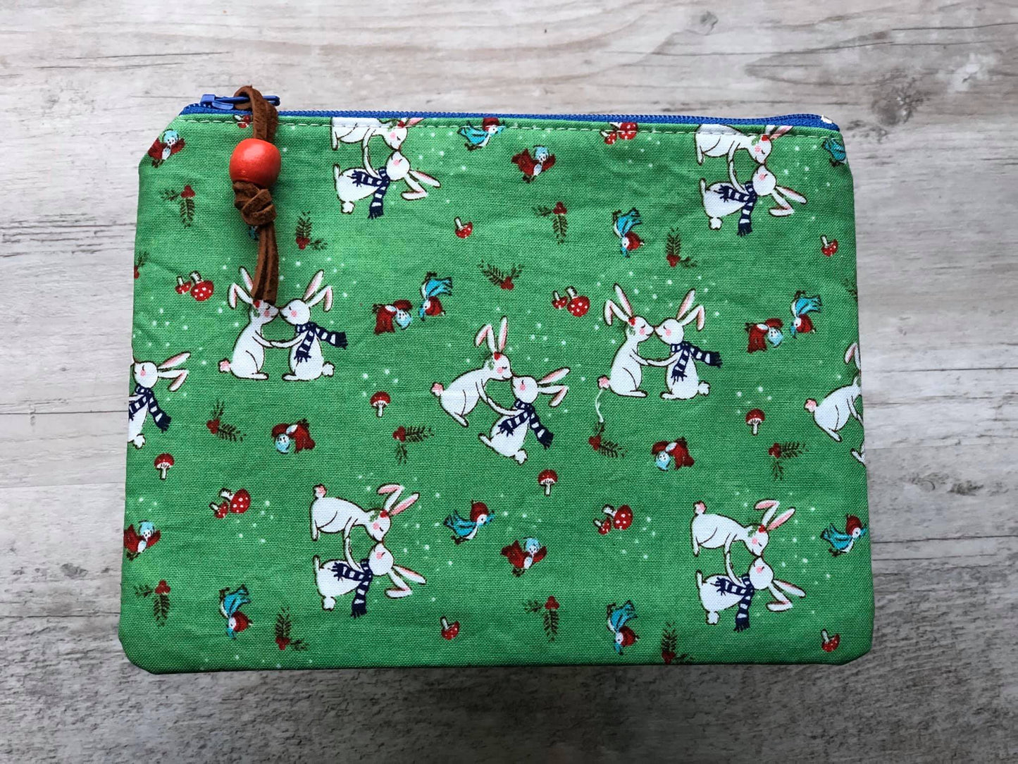 bunnies wearing scarves zippered pouch