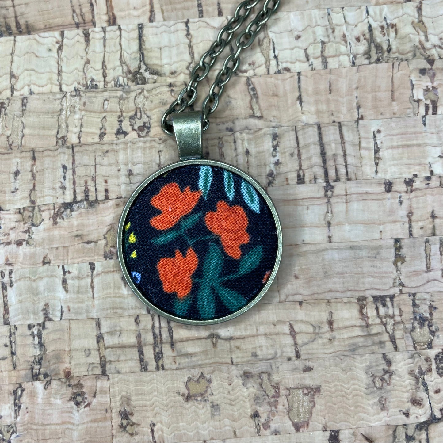 3 small red roses by Rifle Paper co necklace