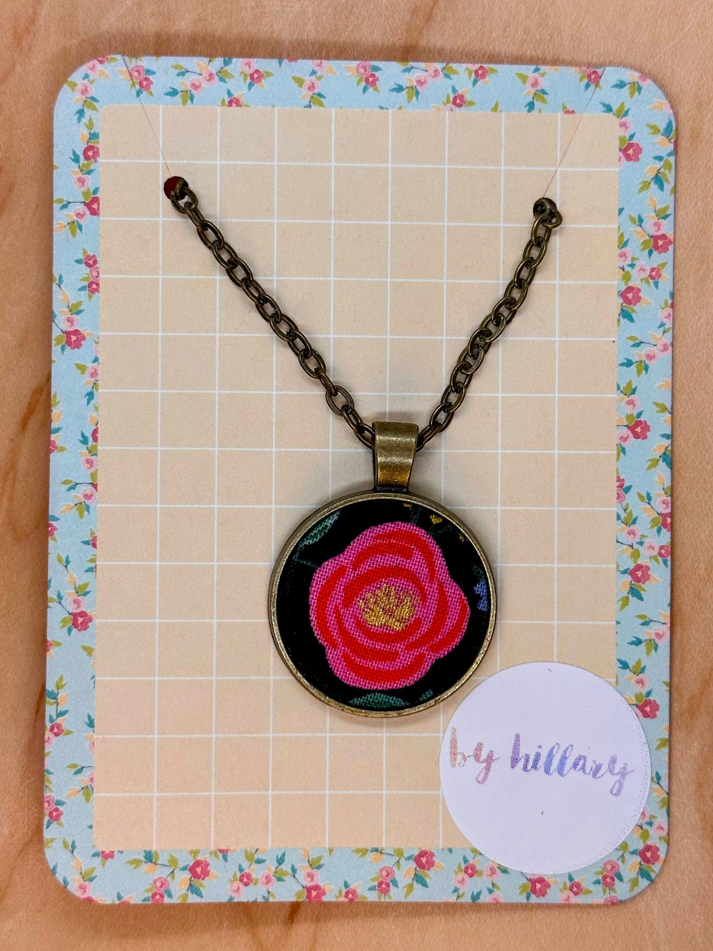 Pink and red on black Rifle Paper co flower fabric necklace