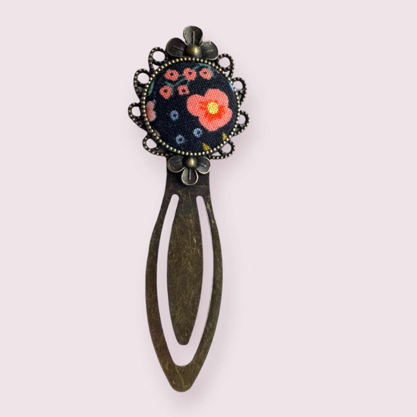 Peach flowers on black bookmark