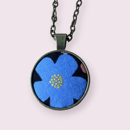 Light blue flower on back Rifle Paper co flower fabric necklace