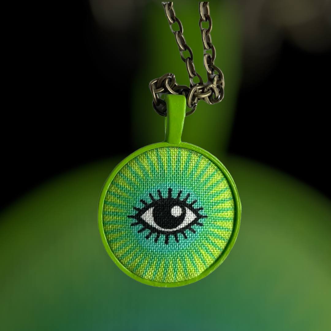 I see you lime green eye necklace