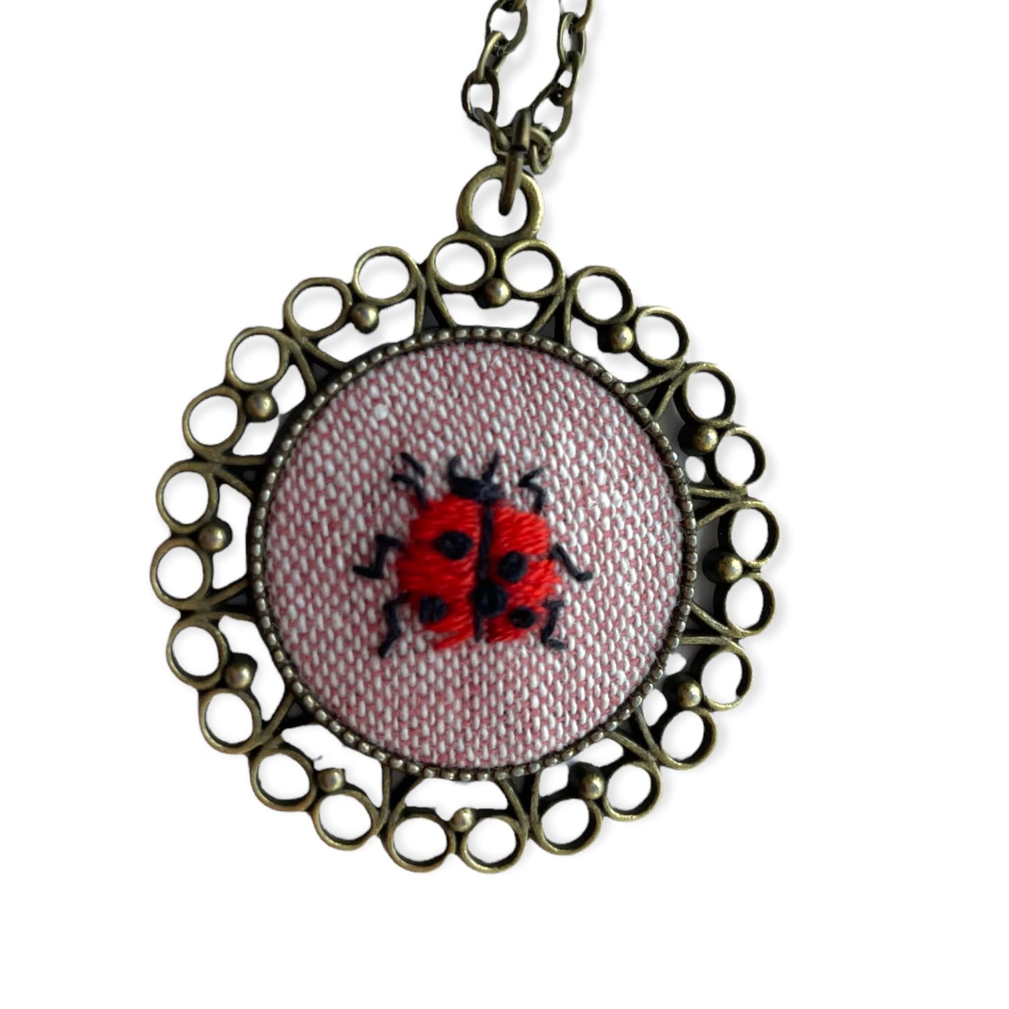 Hand embroidered lady bug necklace