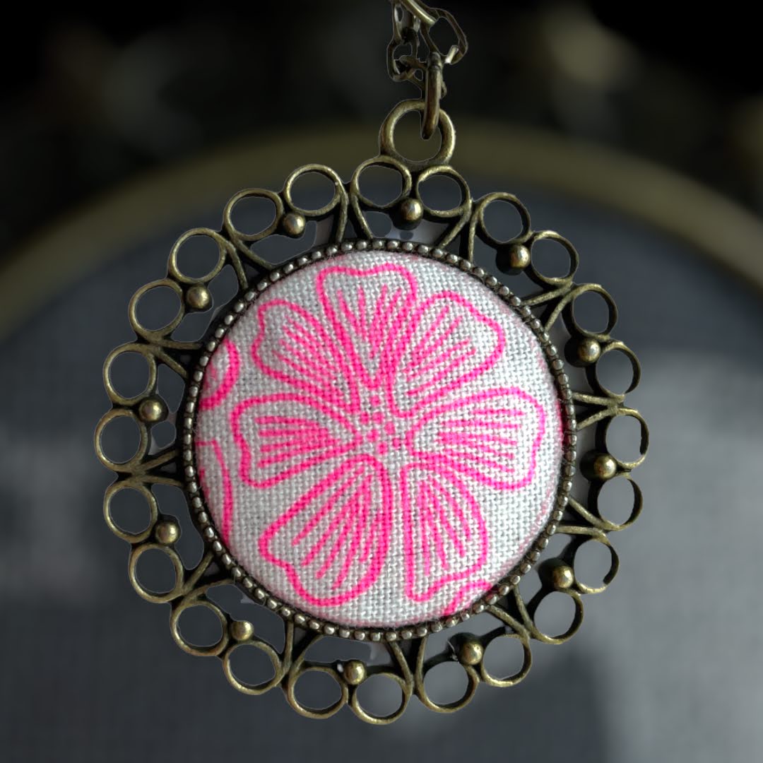 neon pink on white flower from Rifle Paper co flower fabric necklace