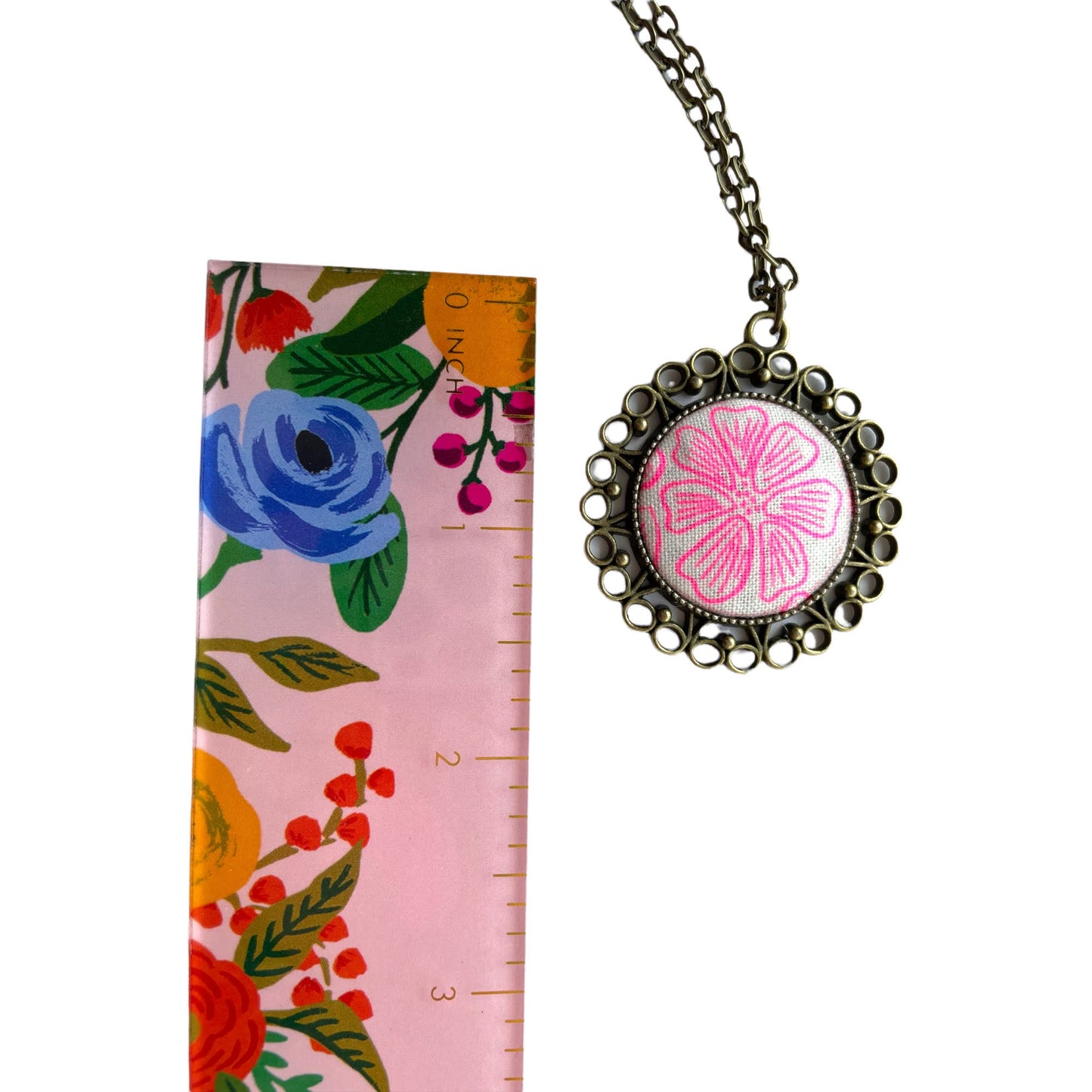 neon pink on white flower from Rifle Paper co flower fabric necklace