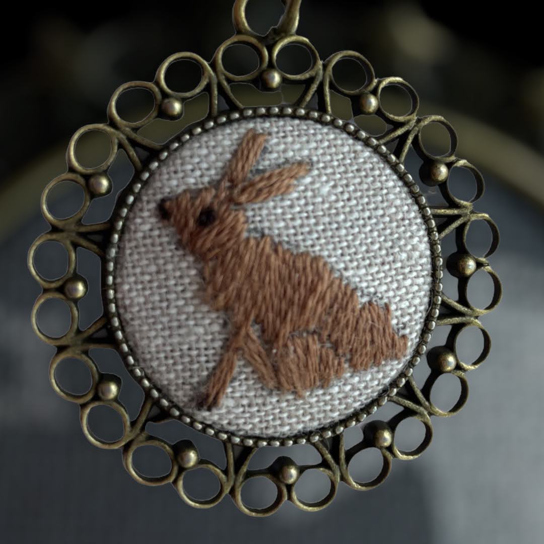 Hand embroidered bunny necklace